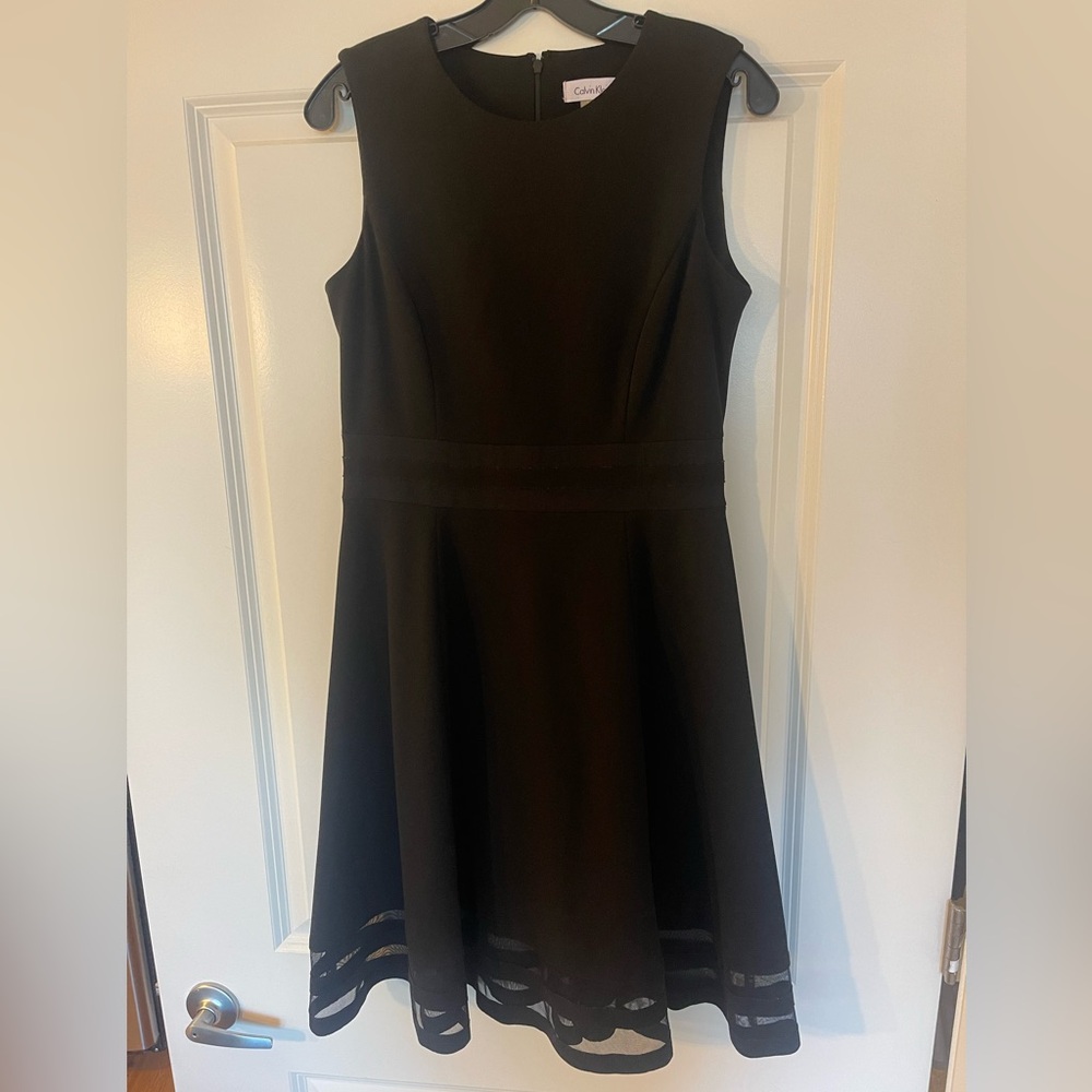 Black knee length with mesh lining on the bottom Calvin Klein size 8